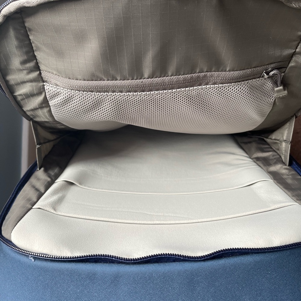 Navy Blue Yeti 22” carry on luggage.